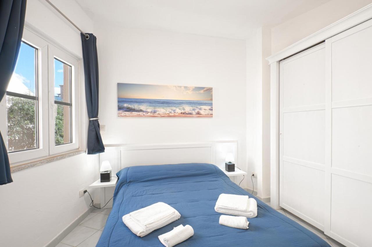 Ferienwohnung Calarossa Bay Isola Rossa Exterior foto